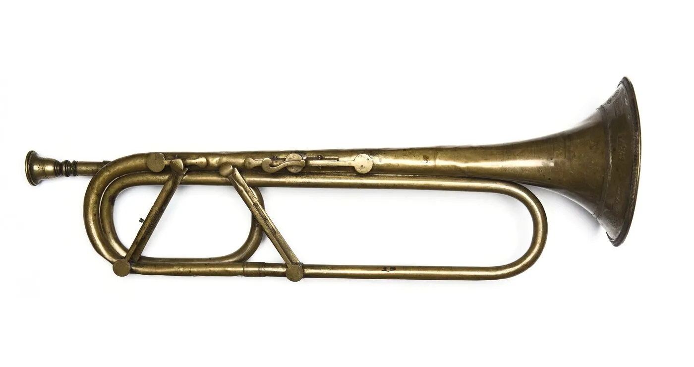 A keyed trumpet with external keywork and separate curved tubing sections